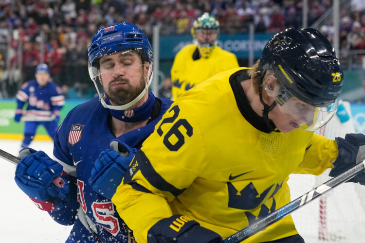 Hughes gets the win in OT
